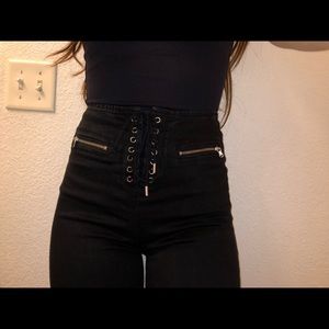 BLACK LACE UP FRONT JEANS SIZE 2